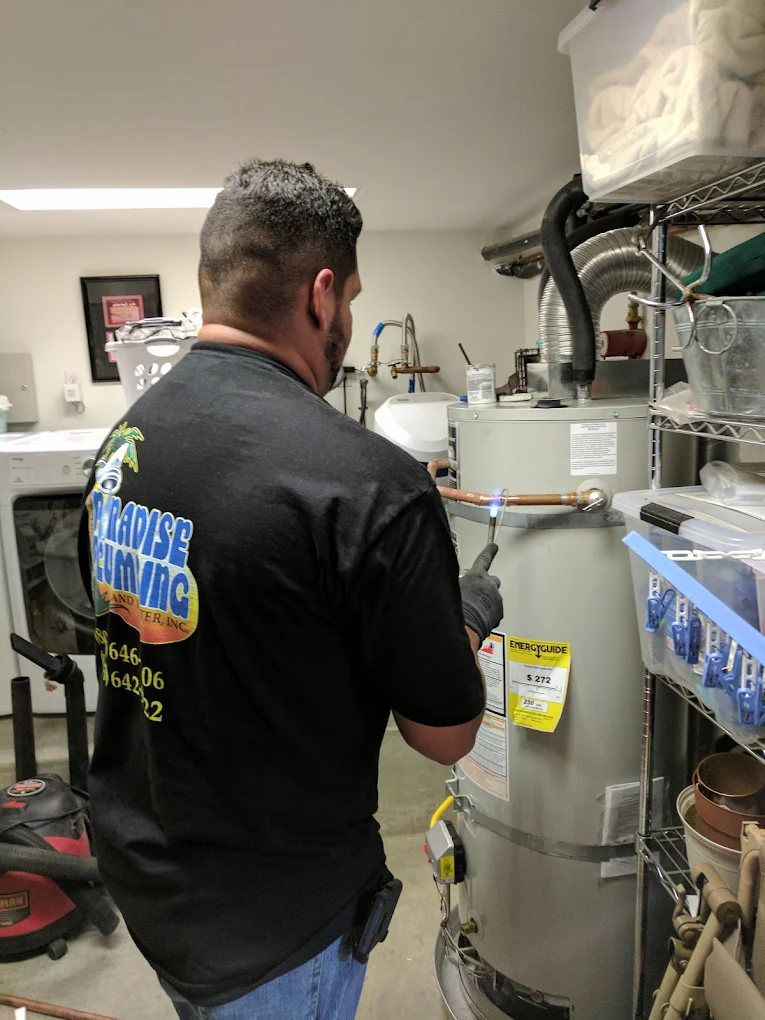 AAA Paradise Plumbing technician servicing a residential water heater in Ventura, CA